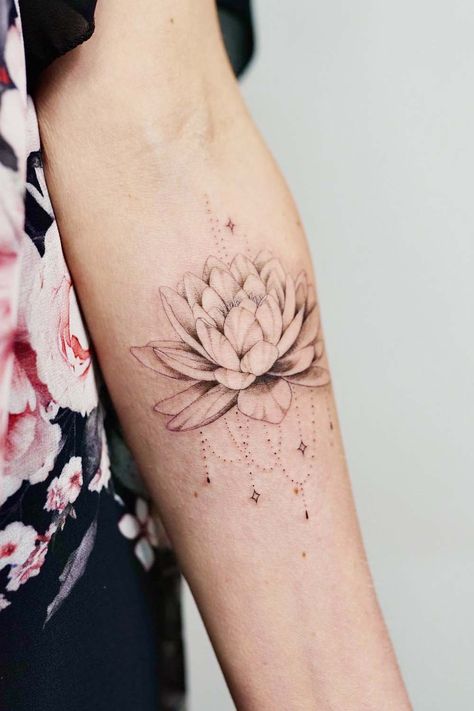 67 Lotus Flower Tattoo Designs: Symbolism and Inspiration White Lotus Tattoo Flower, Lotus Bouquet Tattoo, Forearm Lotus Tattoo, Color Lotus Tattoo, Lotus Flower Tattoo Forearm, Lotus Flower Tattoo Designs For Women, Lotus Flower Wrist Tattoo, Realistic Lotus Flower Tattoo, Lotus Tattoo Ideas For Women