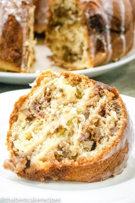 A close up of a piece of cake on a plate, with Nut and Coffee cake Potica Cookies, Serbian Recipes Desserts, Pumpkin Pecan Coffee Cake, Slovenian Recipes, Christmas Coffee Cake, Healthy Coffee Cake, Coffee Cake Bundt, Yeast Cake, Raspberry Coffee Cakes