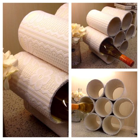 DIY Wine rack, made from mailing cardboard tube. Painted and lined with lace. Cardboard Tube Diy, Large Cardboard Tube Crafts, Cardboard Tubes Repurposed, Crafts Using Large Cardboard Tubes, Cardboard Tubes Repurposed Large, Heavy Duty Cardboard Tube Crafts, Repurpose Cardboard Tubes, Cardboard Tube Crafts, Spool Crafts