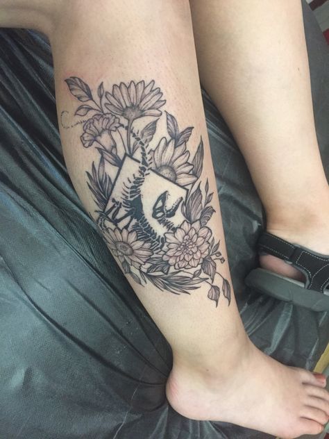 Dinosaur Skeleton Tattoo Floral, Jurassic Park Tattoo Women, Dinosaur Sleeve Tattoos For Women, Velociraptor Claw Tattoo, Dinosaur And Flower Tattoo, Feminine Dinosaur Tattoo, Floral Dinosaur Tattoo, Dinosaur Tattoos For Women, Parasaurolophus Tattoo