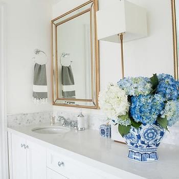 White Dual Washstand with Marble Hex Backsplash Tiles Hex Backsplash, Gold Metallic Wallpaper, Polished Nickel Faucet, Gray And White Bathroom, Grey Kitchen Island, Buffet Lamp, Backsplash Tiles, Gold Mirror Wall, Transitional Bathroom