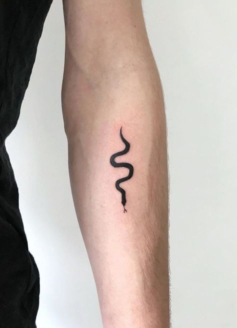 Simple solid black snake tattoo done by @bocharovdima_ in Ukraine | www.otziapp.com Solid Black Snake Tattoo, Filled In Snake Tattoo, Solid Snake Tattoo, Small Solid Black Tattoo, Snake Tattoos Simple, Simple Snake Tattoo, Snake Bracelet Tattoo, Rattlesnake Tattoo, Snake Aesthetic