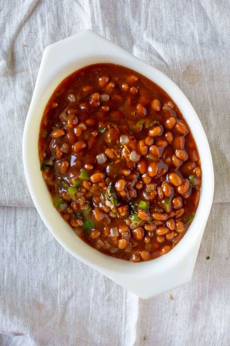 Spicy Baked Beans Recipe. From the Oklahoma Jr. League Cookbook, this is a beautiful combination of spicy and sweet. A perfect side dish for any back yard barbeque party main course. #bakedbeans #spicy #bbq #bestbakedbeans Spicy Baked Beans Recipe, Spicy Baked Beans, Party Main Course, Pork And Beans, Best Baked Beans, Baked Beans Recipe, Barbeque Party, Pork N Beans, Beans Recipe