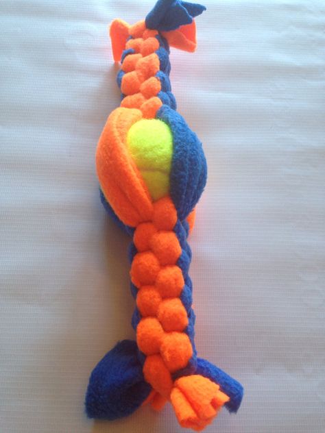 2 in 1 Dog Fleece Pull Toy with squeaker tennis ball middle Homemade Dog Toys, Diy Pet Toys, Diy Dog Toys, Durable Dog Toys, Best Dog Toys, Dog Games, Dog Fleece, Dog Projects, Square Knot