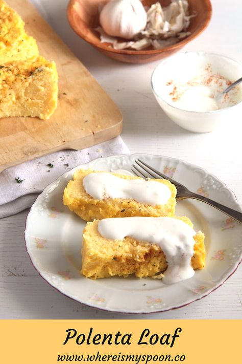 Polenta loaf – a fluffy polenta souffle served with a delicious garlic yogurt sauce. #whereismyspoon #polentaloaf #bakedpolenta #polentasouffle #polentarecipes #howtomakepolenta #cornmealloaf #cornmealrecipes Polenta Souffle, Romanian Polenta, Polenta Recipes Vegan, Garlic Yogurt Sauce, Malai Recipe, Cornmeal Recipes, Garlic Yogurt, Baked Polenta, Polenta Recipes