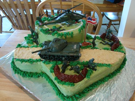 Army Cake - Army theme cake for a 7 yr old who loves anything Army.  Chocolate cake, buttercream frosting.  Toys used for decorations, so he would have something to keep after the cake was gone.  He loved it!  Thanks for looking! Army Birthday Cakes, Army Themed Birthday, Army Cake, Army Birthday Parties, Military Cake, Army Birthday, Army's Birthday, Army Party, Cake Decorating Ideas