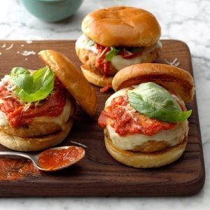 Cajun Crab Burgers Recipe: How to Make It Sliders Recipes Chicken, Tuna Burgers, How To Cook Burgers, Ground Chicken Recipes, Chicken Sliders, Slider Recipes, Summer Lunch, Ground Chicken, Cooking Light