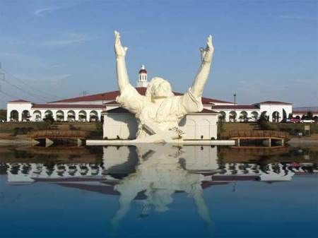 The formerly famous (locally and then nationally) and extremely hideously and (to many of us) tacky statue outside Solid Rock Church north of Cincinnati known as "Touchdown Jesus" that was struck directly by lightning and destroyed on 6/15/10. It made national news and was the subject of a lot of hilarity locally (and nationally. Touchdown Jesus, Ridiculous Pictures, Roadside Attractions, Cincinnati Ohio, King Of Kings, Hug Me, Hotel Deals, Best Hotels, Cincinnati