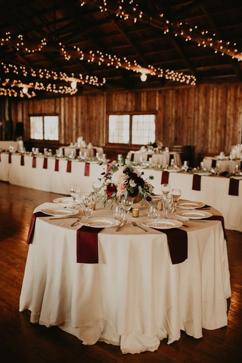 Wedding Flowers Table Runner, Burgundy Quinceanera Decorations Table Settings, Burgundy Wedding Reception Decor, Champagne And Maroon Wedding Theme, Burgundy Wedding Table, Burgundy Barn Wedding, Maroon And Cream Wedding, Rustic Burgundy Wedding, Cabernet Wedding Decor