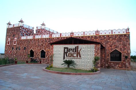 The Red Rock Resort is situated on Bikaner Jaisalmer Highway, India. We provide Lodging, Boarding, Camping and Camel Safari. The restaurant is beautifully designed and is a favorite destination for foreign tourists. Highway Restaurant Design, Highway Restaurant, Resort Luxury, Luxury Exterior, Jaisalmer, House Architecture, House Architecture Design, The Restaurant, Red Rock