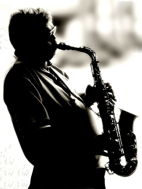 The power of music, captured in a single shot. This saxophone player reminds us of the beautiful intersection of auditory and visual art that we strive to encapsulate.   #Refocus #RefocusCommunity #photography #photographer #camera #usedcameras #cameragear #sunset #NewYork #Music Saxophone Photoshoot, Saxophone Player, Saxophone Players, Power Of Music, Photographer Camera, The Power Of Music, Camera Gear, Visual Art, Photographer