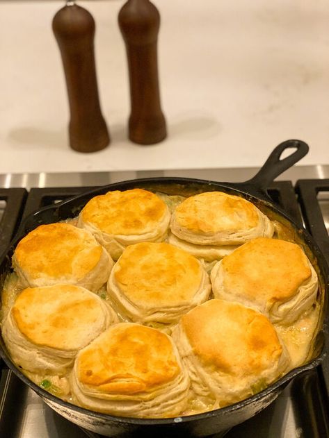 Now that it is getting cooler outside, comfort meals are making their way back into my kitchen. This Biscuit Chicken Pot Pie recipe is a one skillet comfort meal your whole family will love. It is a savory dish that is thrown together in one skillet, which makes for easy clean up on busy nights. To save on time, I took a few short cuts such as using already cooked rotisserie chicken and canned biscuits. However, you can boil and shred two chicken breast, and make your own homemade… Rotisserie Chicken Pot Pie Biscuits, Chicken Pot Pie With Biscuits Dutch Oven, Cast Iron Skillet Chicken Pot Pie With Biscuits, Chicken Pot Pur With Biscuits, East Chicken Pot Pie With Biscuits, Biscuit Chicken Pot Pie, Flakey Biscuits, Flaky Biscuits, Canned Biscuits