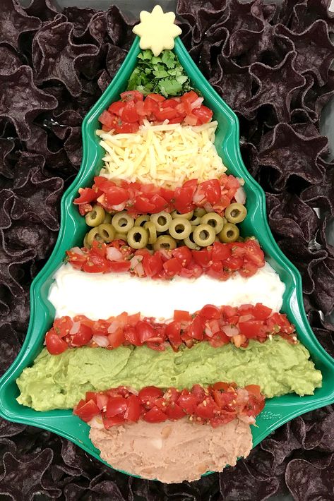 https://thebakermama.com/recipes/christmas-tree-7-layer-dip/ Holiday Party Dips, Christmas Tree Dip, Christmas Party Dips, Christmas Dips, Dips And Appetizers, Snowman Recipes, 7 Layer Dip Recipe, Christmas Keto, Holiday Dips