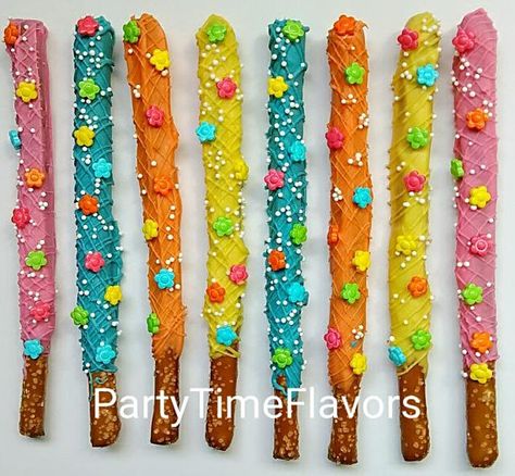 Spring Pretzel Rods, Jungle Pretzel Rods, Flower Pretzels, Encanto Pretzel Rods, Spring Chocolate Covered Pretzels, Luau Chocolate Covered Pretzels, Chocolate Covered Pretzel Sticks, Luau Cookies, Island Birthday