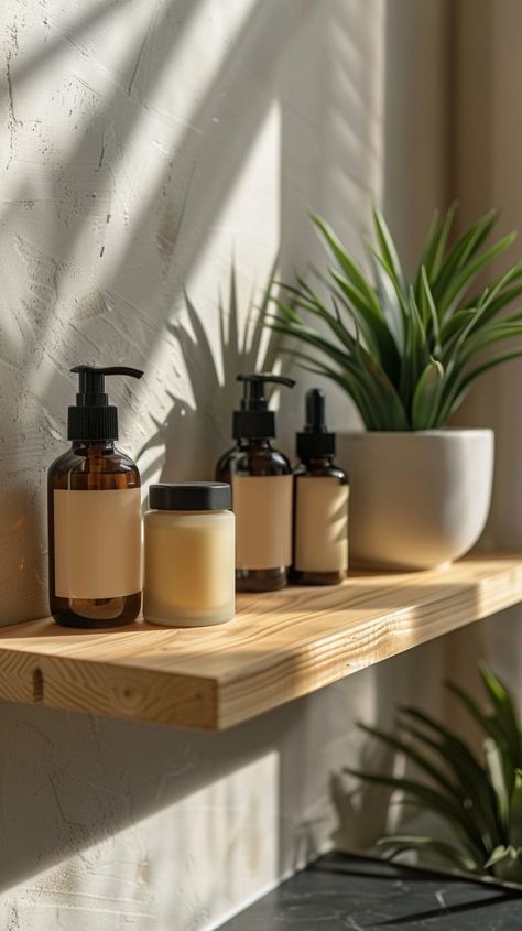 Serene Bathroom Shelf: Amber glass bottles and a green plant basking in the warm sunlight on a wooden shelf. #bathroom #serenity #shelf #amber #bottles #plant #sunlight #wooden #aiart #aiphoto #stockcake https://ayr.app/l/LWWN Amber Bathroom Decor, Amber Glass Bathroom, Amber Bathroom, Serene Bathroom, Shelf Bathroom, Amber Bottles, Amber Glass Bottles, Wooden Shelf, Bathroom Shelf