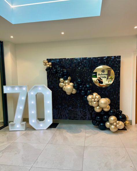 🕺🪩 HELSTON TURNS 70 🪩🕺⁣ ⁣ Celebrating in style! A stunning 70th birthday display (at an even 𝘮𝘰𝘳𝘦 stunning house!) with elegant black and gold balloons, paired with our black sequin wall and illuminated numbers from @big_bash_events . Perfect for a milestone event! ✨ ⁣ ⁣ It’s always an honour to be asked to decorate for someone you personally know - it means the world to me to be trusted with your memorable occasions. ⁣ ⁣ #BalloonDisplay #70thBirthday #ElegantDecor #BlackAndGold⁣ #LuxuryBallo... Black Arch, Sequin Wall, Black And Gold Balloons, Birthday Display, Balloon Display, Gold Balloons, 70th Birthday, Elegant Decor, 60th Birthday