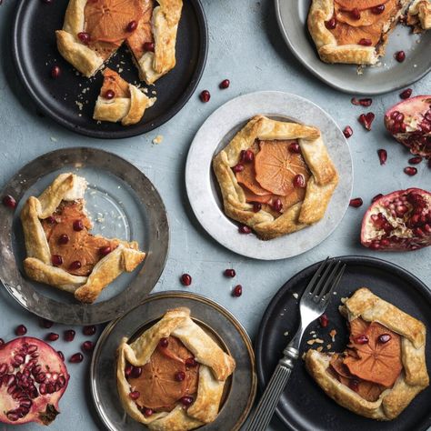 A hidden layer of chocolate takes these fruity galettes up a notch. Mini Persimmon Galettes   Save Recipe Print Yields: 6 (4-Inch) Galettes Ingredients 1 tablespoon sugar, plus more for sprinkling ½ teaspoon kosher salt ½ teaspoon apple pie spice 2 cups thinly sliced Fuyu persimmons Tart Dough (recipe follows) ½ cup finely chopped semisweet … Persimmon Galette, Tart Dough Recipe, Tart Dough, Mini Pie, Spiced Chocolate, Apple Pie Spice, Snack Attack, Mini Pies, Round Cake Pans