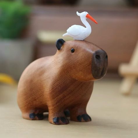 A wooden-carved capybara, its head can hold anything.🤣 #wood #woodcarving #wooddesign #capybara #viral Fondant Art, Whittling, Wood Design, Wood Carving, Instagram A, Hold On, Felt, Carving, Canning