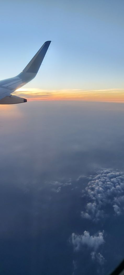 The view from inside a flight's window side seat. It shows clouds and the sunset. Indigo Flight Window View, Flight Window View, Amma Quotes, Flight View, Airplane Window View, Window Siding, Night Flight, Airplane Window, Airline Flights