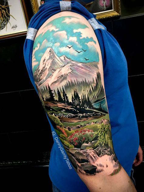 Realistic mountain and forest scene with birds, foliage and a stream at the forefront Forest Tattoo Arm, Forest Tattoo Sleeve, Tree Tattoo Color, Outdoor Tattoo, Colour Tattoos, Mountain And Forest, Pine Tree Tattoo, Tattoo Color, Forest Tattoos