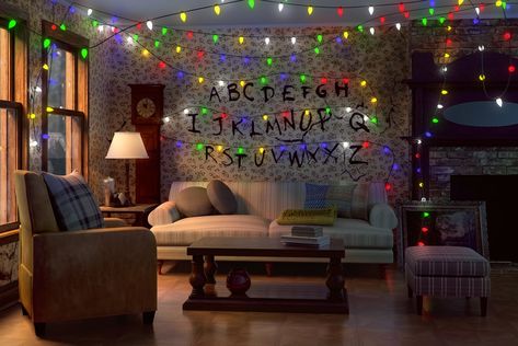 Stranger Things-Inspired '80s-Style Living Room Haunted House For Kids, Halloween Baby Photos, Zoom Wallpaper, Office Halloween Decorations, Haunted House Diy, Purple Living Room, Halloween Office, Living Room Wallpaper, Stranger Things Halloween