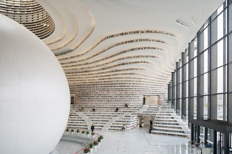 Image 8 of 23 from gallery of Tianjin Binhai Library / MVRDV + Tianjin Urban Planning and Design Institute. Photograph by Ossip van Duivenbode Chinese Library, Tianjin Binhai Library, Tianjin China, Unique Library, Interior Design Institute, Beautiful Library, Library Architecture, Design Institute, Archi Design