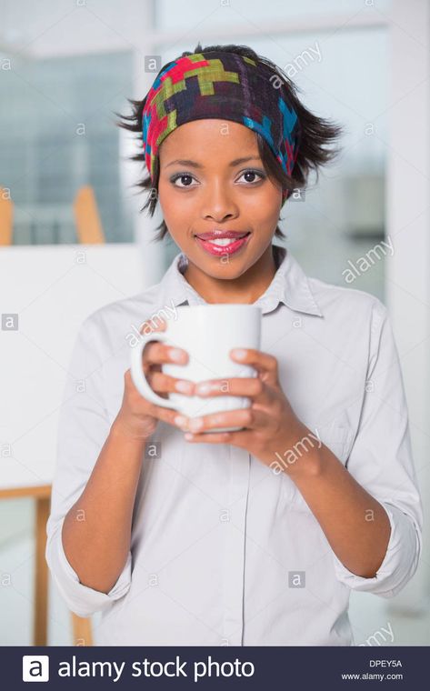 Download this stock image: Artistic woman holding cup of coffee - DPEY5A from Alamy's library of millions of high resolution stock photos, illustrations and vectors. Hold Cup Reference, Holding A Coffee Cup Pose, Person Holding Teacup, Person Holding Coffee Reference, Holding Cup Pose Reference, Person Holding Mug Reference, Holding Coffee Reference, Person Holding Cup Reference, Hands Cupping Face Reference