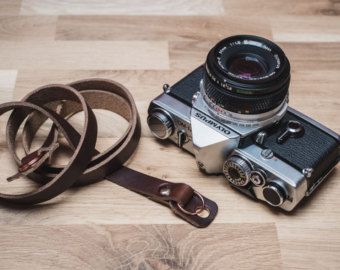 Leather Camera Strap with Camera Bumpers | Hand Made Leather Camera Strap | DSLR Camera Strap | Sterling Photographer Tshirt, Camera Neck Strap, Dslr Camera Straps, Horween Chromexcel, Tshirt Photography, Hand Made Leather, Leather Camera Strap, Camera Dslr, Horween Leather