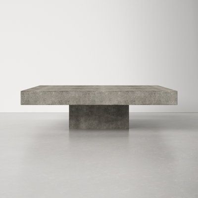 The Dove pedestal coffee table is a classy statement of sturdiness featuring a dark gray fiber reinforced natural concrete tabletop with an acrylic sealed finish to prevent staining. This modern concrete Dove coffee table is a fascinating piece that would add elegance to any living space. | AllModern Dove Pedestal Coffee Table Concrete in Gray, Size 12.0 H x 43.0 W x 43.0 D in | Wayfair Coffee Table Concrete, Concrete Pedestal, Pedestal Coffee Table, Mirror Inspiration, Display Coffee Table, Hallway Wall Decor, Contemporary Coffee Table, Upholstered Sectional, Coffee Table Wayfair