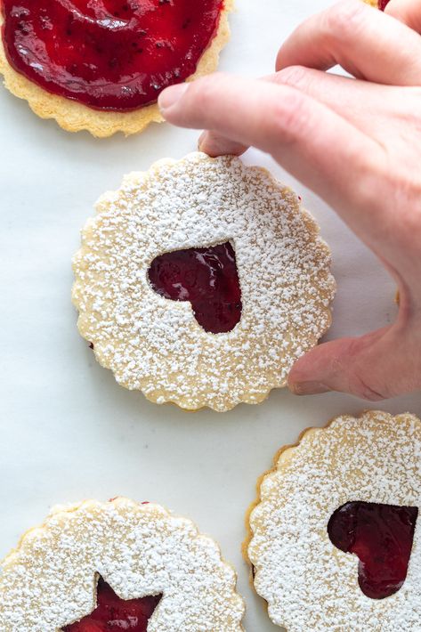 Stunning Shortbread Linzer Cookies with Cranberry Filling - A Red Spatula Almond Linzer Cookies, Cookies With Raspberry Jam, Raspberry Linzer Cookies, Cranberry Filling, Almond Shortbread, Popular Cookies, Shortbread Recipe, Almond Flour Cookies, Linzer Cookies