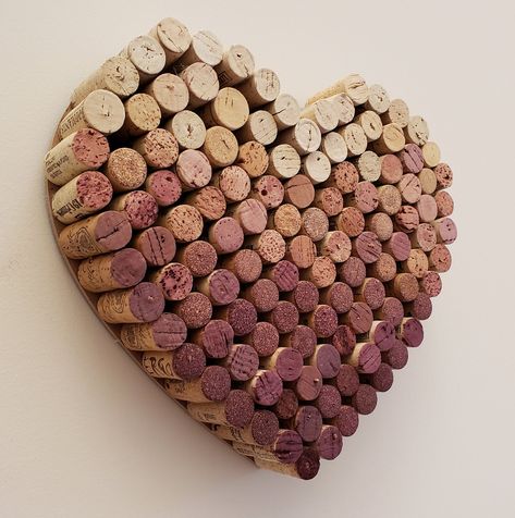 "A beautiful piece of art made from natural upcycled wine corks arranged in the shape of a heart with an ombre shading going from light to dark corks! This would be perfect for a housewarming gift, wedding shower, or your own home decor! This piece of art could also be used as a cork board & would be perfect for your entryway, kitchen, office, laundry room & will fit any modern farmhouse decor! All corks are hand glued to ensure they are secure & the board is made to last! This frame Wine Cork Heart, Wine Cork Table, Wine Corks Decor, Cork Heart, Upcycled Wine Corks, Wine Cork Diy Projects, Office Laundry Room, Cork Diy Projects, Cork Crafts Christmas