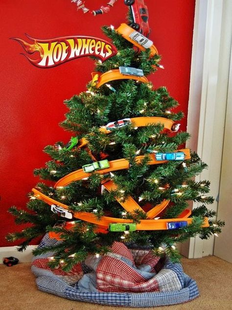 12 Truly Mind-Blowing Christmas Tree Decorations - Woman's World Hot Wheels Christmas Tree, Amazing Christmas Trees, Tree Decorations Christmas, Christmas Trees For Kids, Tree Themes, Creative Christmas Trees, Unique Christmas Trees, Cool Christmas Trees, Christmas Tree Ideas