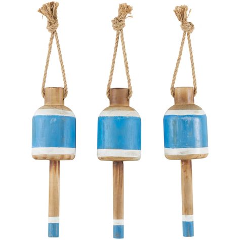 "Buy the Blue & White Anchor, Sailboat & Ship Wheel Buoy Wall Décor Set at Michaels. com. This set of buoy inspired décor is crafted from a combination of wood and rope material for a sturdy and lasting design. They feature distressed coastal tones that incorporate white, brown and bright blue. Accent pieces for the wall highlight a unique buoy shape with various graphics and calming shades that bring a hint of coastal living to the home. Inspired by blissful serenity and the allure of the sea, Wheel Wall Decor, Decor With Ropes, Wood Anchor, Woven Chair, Bedroom Corner, Ship Wheel, Blue Accent, Nails And Screws, Blue Wood