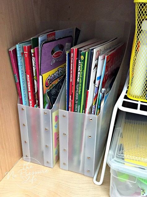 Such a great way to organize coloring books! Coloring Books Storage Ideas, Organizing Coloring Books, Playroom Book Organization, How To Organize Coloring Books, Organize Coloring Books, Organizing Coloring Supplies, Coloring Book Organization Kids, Coloring Supplies Organization, Coloring Book Organization