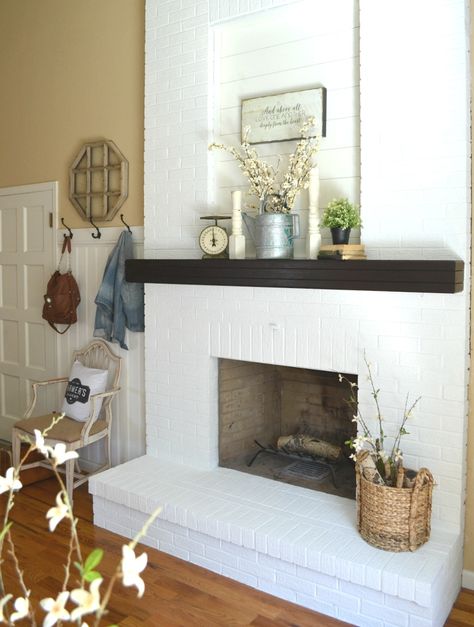 How to Paint a Brick Fireplace in 3 Simple Steps Fireplace Decorations, White Brick Fireplace, Painted Brick Fireplace, Painted Brick Fireplaces, Fireplace Cover, Brick Fireplace Makeover, Paint Fireplace, Farmhouse Fireplace, White Fireplace