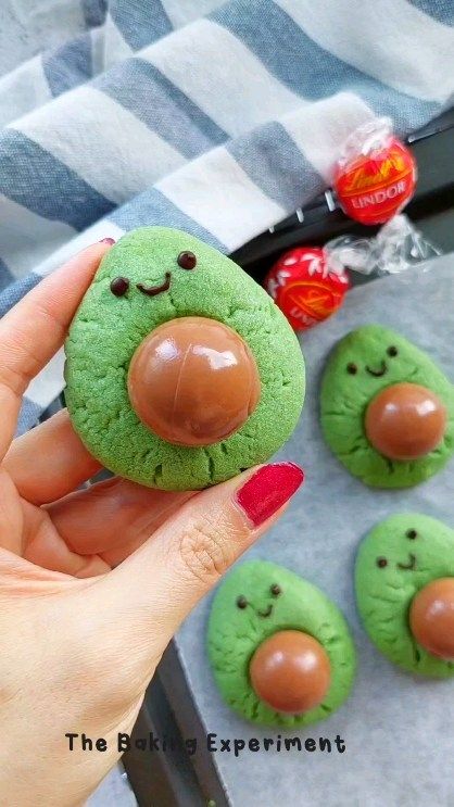 Avocado thumbprint cookies 🥑 and of course I had to use lindt chocolates as the avocado pit 🍫 #thumbprintcookies #lindtchocolate… | Instagram Avocado Thumbprint Cookies, Avocado Cookies Decorated, Reptile Cookies, Avocado Cookies, Avocado Cake, Avocado Pit, Desert Ideas, Food Shapes, Taco Party