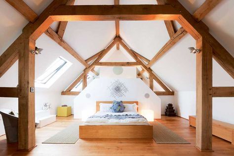 oak frame exposed beams in the bedroom of a barn conversion Barn Conversion Interiors, Barn Bedrooms, Attic Makeover, Oak Frame House, Converted Barn, Attic Design, Attic Bedrooms, Loft Room, Barn Decor