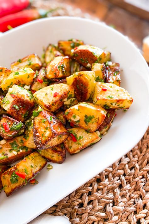 The Most ADDICTIVE Potatoes | Roasted Potatoes with Chimichurri Sauce Sides With Peruvian Chicken, Potatoes With Chimichurri, Argentinian Potatoes, Peruvian Sides Recipes, Peruvian Recipes Side Dishes, Peruvian Potato Salad, Brazilian Potatoes, South American Side Dishes, Peruvian Sides