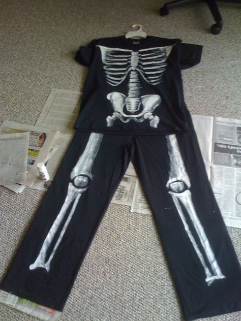 Painted skeleton costume. Acrylic paint on t shirt and pajama pants Skeleton Art On Clothes, Diy Skeleton Pants, Skeleton Painted Jeans, Skeleton Legs Pants, Cute Skeleton Costume, Easy Skeleton Costume, Casual Skeleton Costume, Skeleton Pajamas, Painted Skeleton