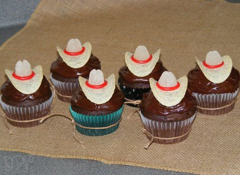 Cowboy Hat Snacks, Cowboy Hat Cupcakes, Pringle Cowboy Hats, Chocolate Pringle Cowboy Hat, Chocolate Covered Pringles Cowboy Hats, Cowboy Hat Pringles, Cowboy Hat Pull Apart Cupcake Cake, Chocolate Cowboy Hats, Chocolate Frosted Cupcakes