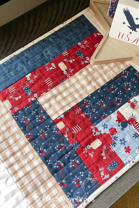 easy scrappy fat quarter log cabin tablerunner quilt pattern by Fresh Dew Drops Quilting with Red White and True patriotic fabric from Riley Blake Designs Log Cabin Table Runner, Table Runner Quilt Pattern, Scrappy Log Cabin, Riley Blake Quilt, Cabin Table, Quilt Sampler, Log Cabin Quilt Pattern, Runner Pattern, Patriotic Fabric