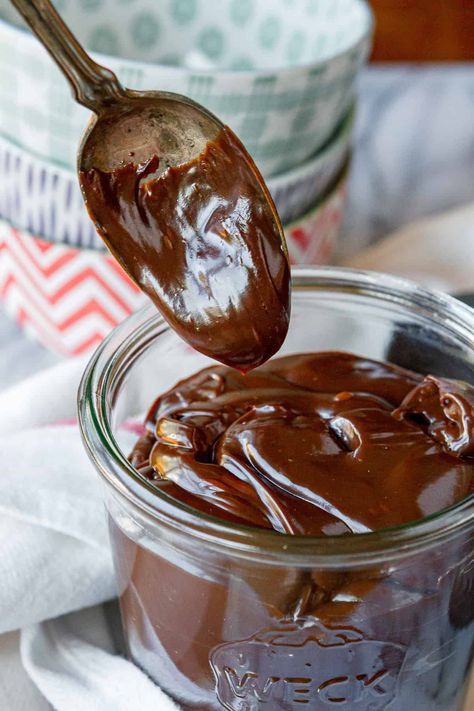 Homemade Hot Fudge Sauce -- this thick and rich hot fudge sauce recipe is made with just 5 simple ingredients! Sweetened condensed milk makes it ultra creamy and a shot of brewed coffee amplifies the deep chocolate flavor. | recipe for hot fudge sauce | easy hot fudge sauce | how to make hot fudge sauce Hot Fudge Sauce Recipe, Fudge Sauce Recipe, Evaporated Milk Recipes, Homemade Hot Fudge, Chocolate Fudge Sauce, Chocolate Pudding Recipes, Hot Fudge Sauce, Homemade Nutella, Vegan Peanut Butter