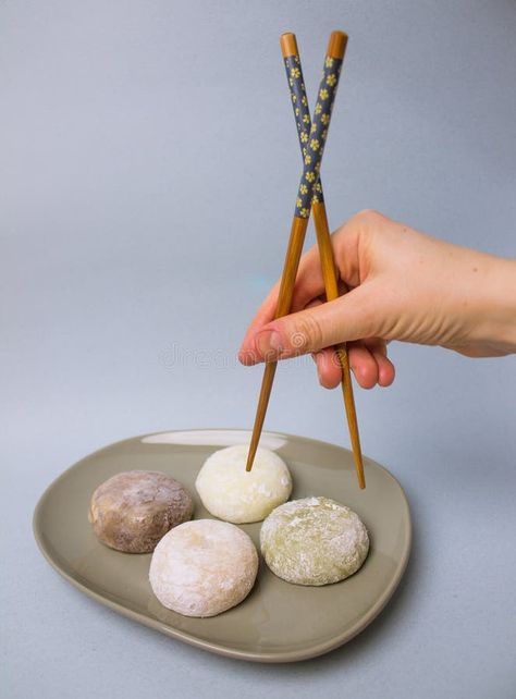 Chopsticks in hand Japanese dessert mochi daifuku in rice dough Asian sweet food stock photography Mochi Photography, Rice Dough, Mochi Ice Cream, Food Stock, Japanese Dessert, Photography Food, Sweet Food, Chopsticks, Food Photo