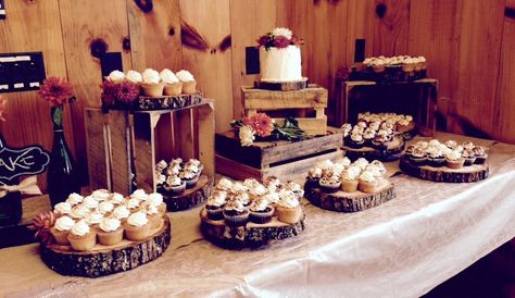 Rustic cake/ cupcake display with wooden platters and wooden crates. Garnished with fresh wild flowers. thebakersbox.net Wooden Crates Cupcake Display, Cake Cupcake Display, Rustic Cupcake Display, Rustic Wooden Crates, Wedding Cupcake Display, Rustic Cupcakes, Cupcake Table, Tent Decor, Buffet Dessert