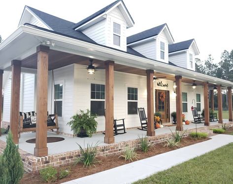 Wood Beams Outside Of House, Country Ranch Style Homes Farmhouse Wrap Around Porches, L Shape Porch Ideas, White House Black Windows Wood Accents, White Farmhouse With Shutters, Small Farmhouse Exterior Ideas, Remodel Front Of House, White Rustic House Exterior, White And Black House With Wood Accents