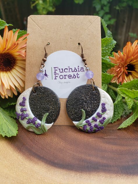 Crescent moon and lavender polymer clay earrings by Fuchsia Forest Clay Designs   #fuchsiaforestclaydesigns #polymerclayjewelry #polymerclay #clayembroidery #clayflowers #handmadejewelry #uniquejewellery #lavender #clayearrings #polymerclayearrings #handmade Lavender Clay Earrings, Polymer Clay Moon Earrings, Polymer Clay Lavender, Summer Healing, Polymer Clay Moon, Clay Moon, Clay Fairy, Clay Inspo, Clay Designs