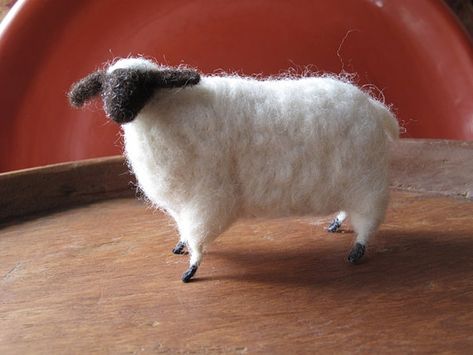 This chubby little lamb is a perfect toy for small dolls, a shelf sitter or perhaps an ornament. Could even be used as a pin cushion. I wanted it to have a primitive vintage feel. Measures: 5 Long x 3.5 Tall. He will be made to order and takes about 3-5 days to create. Feel free to contact me w/ any questions. Needle Felt Sheep, Sheep Decor, Fleece Crafts, Wool Sheep, Felted Christmas, Sheep Crafts, Primitive Americana, Primitive Patterns, Needle Felted Christmas