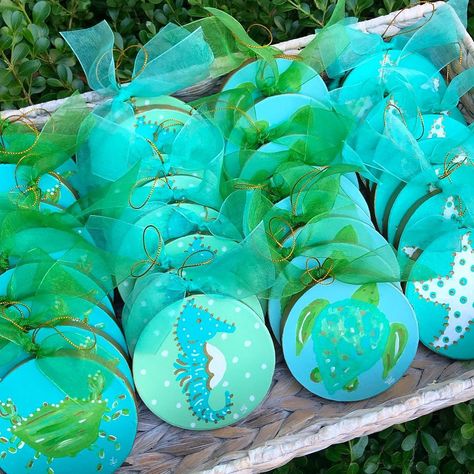 I have loved painting so many ornaments this year. Heading up to the studio to paint more today. I love rainy days when I get to stay home and paint😊  #turquoisechristmas #colorsofthesea #christmasornaments #coastalchristmas #coastalchristmasornaments #coastalchristmasdecor #clpicks #beachornaments #crabs #seahorses #seaturtles #starfish #beachlife #beachchristmas #beachchristmastree #beachchristmasdecor #lemondaisydesign #christmasdecor #christmasornaments #handpainted #etsygifts Coastal Christmas Ornaments, White Elephant Christmas, Beach Christmas Trees, Christmas Hand Painted, Sand Dollar Ornament, Elephant Christmas, Beach Christmas Decorations, Coastal Ornament, Turquoise Christmas