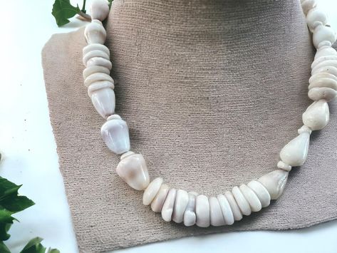 Dwarf Cone Shell & Puka Shell Necklace 🐚 Crafted from ethically and lovingly collected Hawaiian shells in a mix of whites, creams, purples, & peaches. Available in my Of The Sea & Collection. • • #pukashellnecklace #coneshell #shellsofhawaii #pukashells #handmadejewelry Cone Shell, Puka Shell Necklace, Puka Shell, Necklace Craft, Seashell Crafts, Shell Necklace, Shell Necklaces, Peaches, Sea Shells