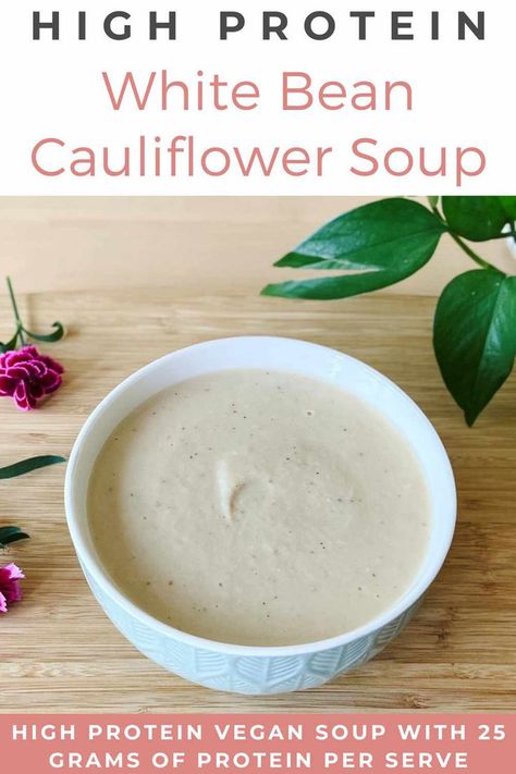 cauliflower and white bean soup in a blue bowl on a bamboo chopping board with 2 plant leaves in the background White Bean Potato Soup, Potato White Bean Soup, Potato And White Bean Soup, Bean Potato Soup, 25 Grams Of Protein, Cauliflower Potatoes, Creamy Cauliflower Soup, Healthy Soups, Clean Eating Lunch